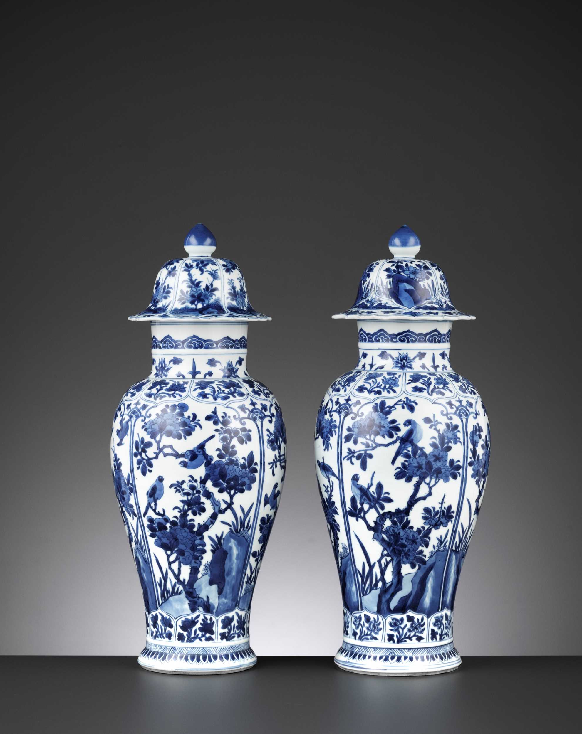Lot 216 - A PAIR OF BLUE AND WHITE BALUSTER VASES AND COVERS, KANGXI PERIOD