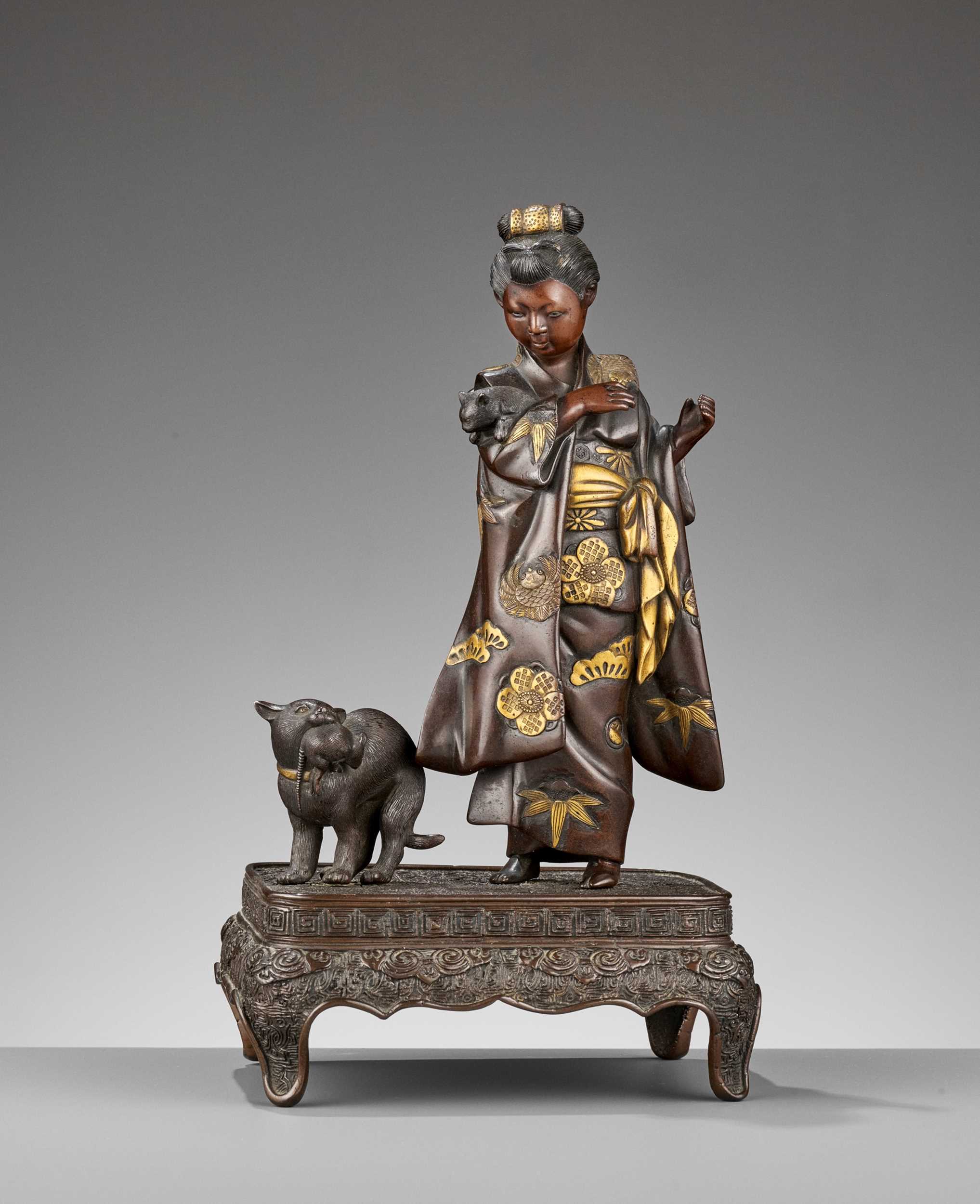 Lot 7 - MIYAO: A RARE GOLD-INLAID BRONZE OKIMONO OF A LADY WITH CATS