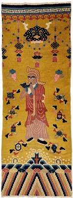 Lot 512 - A BUDDHIST TEMPLE PILLAR RUG DEPICTING A LAMA BLOWING A CONCH