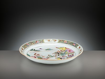 Lot 499 - A LARGE FAMILLE ROSE ‘EQUESTRIANS’ DISH, YONGZHENG PERIOD