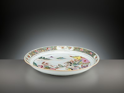 Lot 499 - A LARGE FAMILLE ROSE ‘EQUESTRIANS’ DISH, YONGZHENG PERIOD