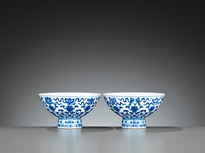 Lot 230 - A PAIR OF BLUE AND WHITE ‘BAJIXIANG’ STEM BOWLS, QIANLONG MARKS AND OF THE PERIOD