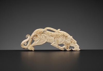 Lot 66 - AN ALTERED JADE ‘TIGER’ PENDANT, EASTERN ZHOU DYNASTY
