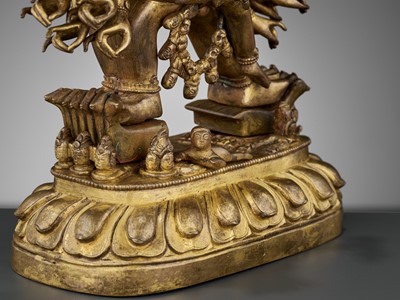 Lot 414 - A GILT BRONZE FIGURE OF VAJRABHAIRAVA AND VAJRA VETALI, QIANLONG