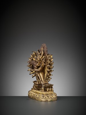 Lot 414 - A GILT BRONZE FIGURE OF VAJRABHAIRAVA AND VAJRA VETALI, QIANLONG