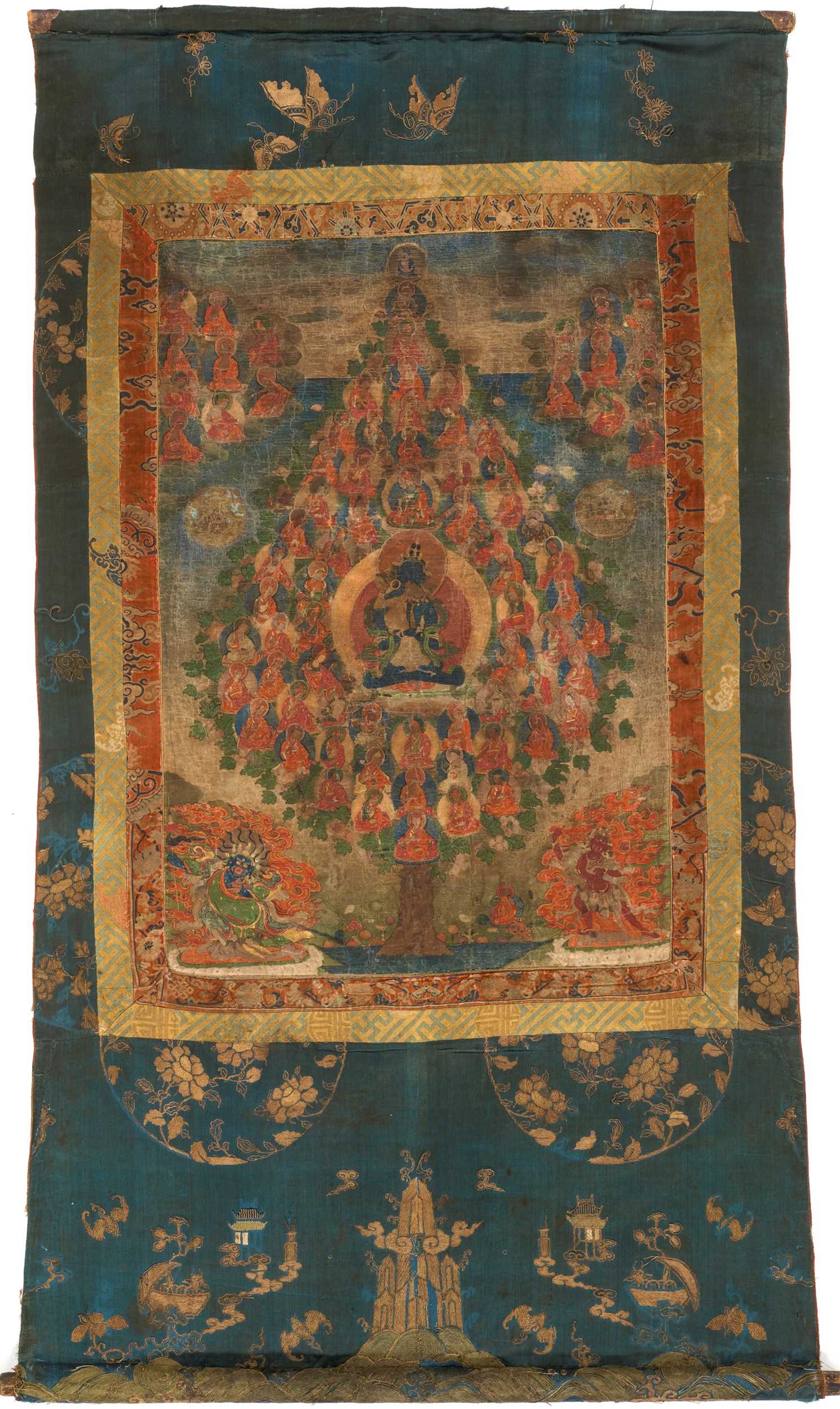 Lot 489 - A RARE THANGKA DEPICTING VAJRADHARA AND CONSORT WITHIN A REFUGE FIELD, 18TH CENTURY