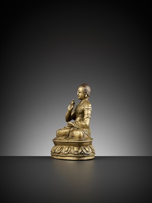Lot 391 - A SILVER-INLAID BRONZE FIGURE OF LOWO KHENCHEN SONAM LHUNDRUP, ABBOT OF THE KINGDOM OF LO