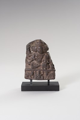 Lot 1215 - A SMALL STONE RELIEF OF SADASHIVA AND CONSORT, PALA PERIOD