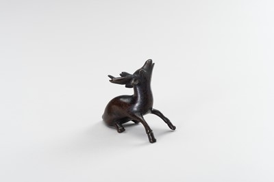 Lot 25 - A CHINESE BRONZE FIGURE OF A STAG