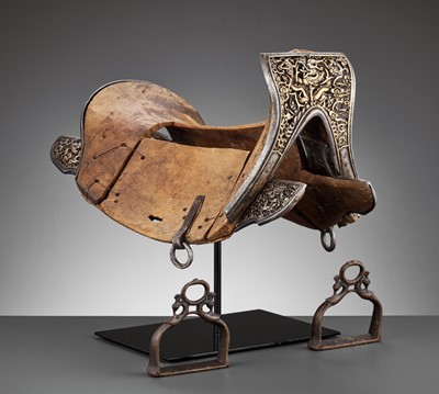 Lot 378 - A PARCEL-GILT IRON AND WOOD ‘DRAGON’ SADDLE, YONGLE PERIOD