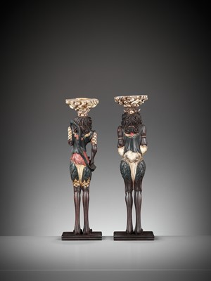 Lot 357 - A PAIR OF PAINTED AND LACQUERED WOOD FIGURAL CANDLESTICKS DEPICTING ONI