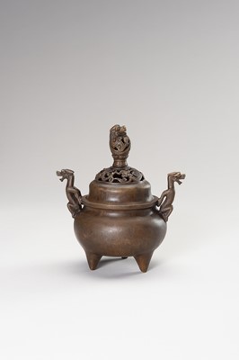 Lot 61 - A BRONZE TRIPOD CENSER WITH DRAGONS