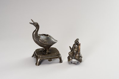 Lot 22 - A GOLD AND SILVER INLAID BRONZE CENSER OF WANG XIZHI RIDING A GOOSE