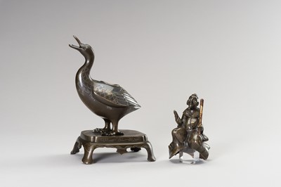 Lot 22 - A GOLD AND SILVER INLAID BRONZE CENSER OF WANG XIZHI RIDING A GOOSE