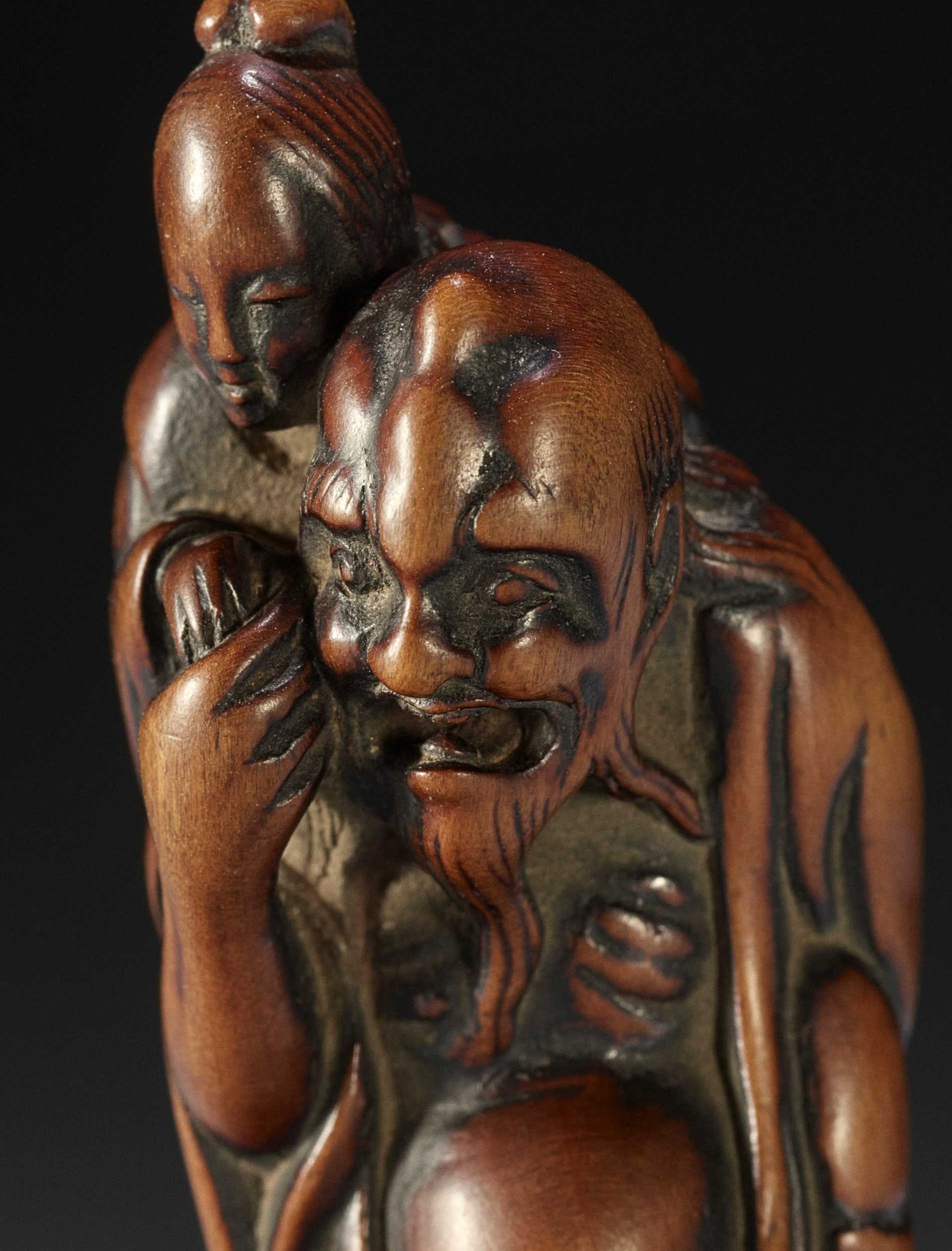 Netsuke Lot 120 - A TALL EARLY EDO SCHOOL WOOD NETSUKE OF