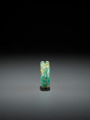 Lot 58 - A TURQUOISE MATRIX ‘PIG-DRAGON’ PENDANT, SHANG TO WESTERN ZHOU DYNASTY