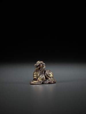 Lot 361 - A PAIR OF GILT BRONZE ‘MYTHICAL BEAST’ WEIGHTS, EASTERN ZHOU TO WESTERN HAN
