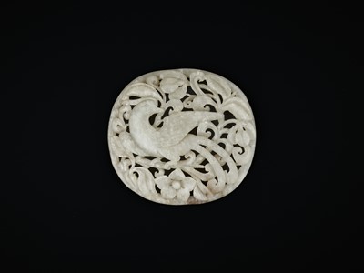 Lot 91 - A PALE CELADON JADE RETICULATED ‘PHEASANT’ PLAQUE, MING DYNASTY