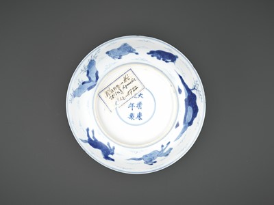 Lot 261 - A BLUE AND WHITE ‘EIGHT HORSES OF MUWANG’ DISH, KANGXI MARK AND PERIOD
