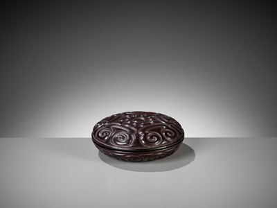 Lot 55 - A BLACK TIXI LACQUER CIRCULAR BOX AND COVER, MING DYNASTY