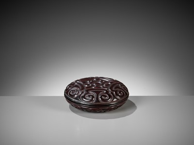 Lot 55 - A BLACK TIXI LACQUER CIRCULAR BOX AND COVER, MING DYNASTY
