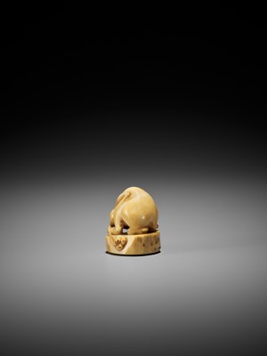 Lot 62 - A VERY RARE NARWHAL TUSK NETSUKE OF A RABBIT WITH REISHI