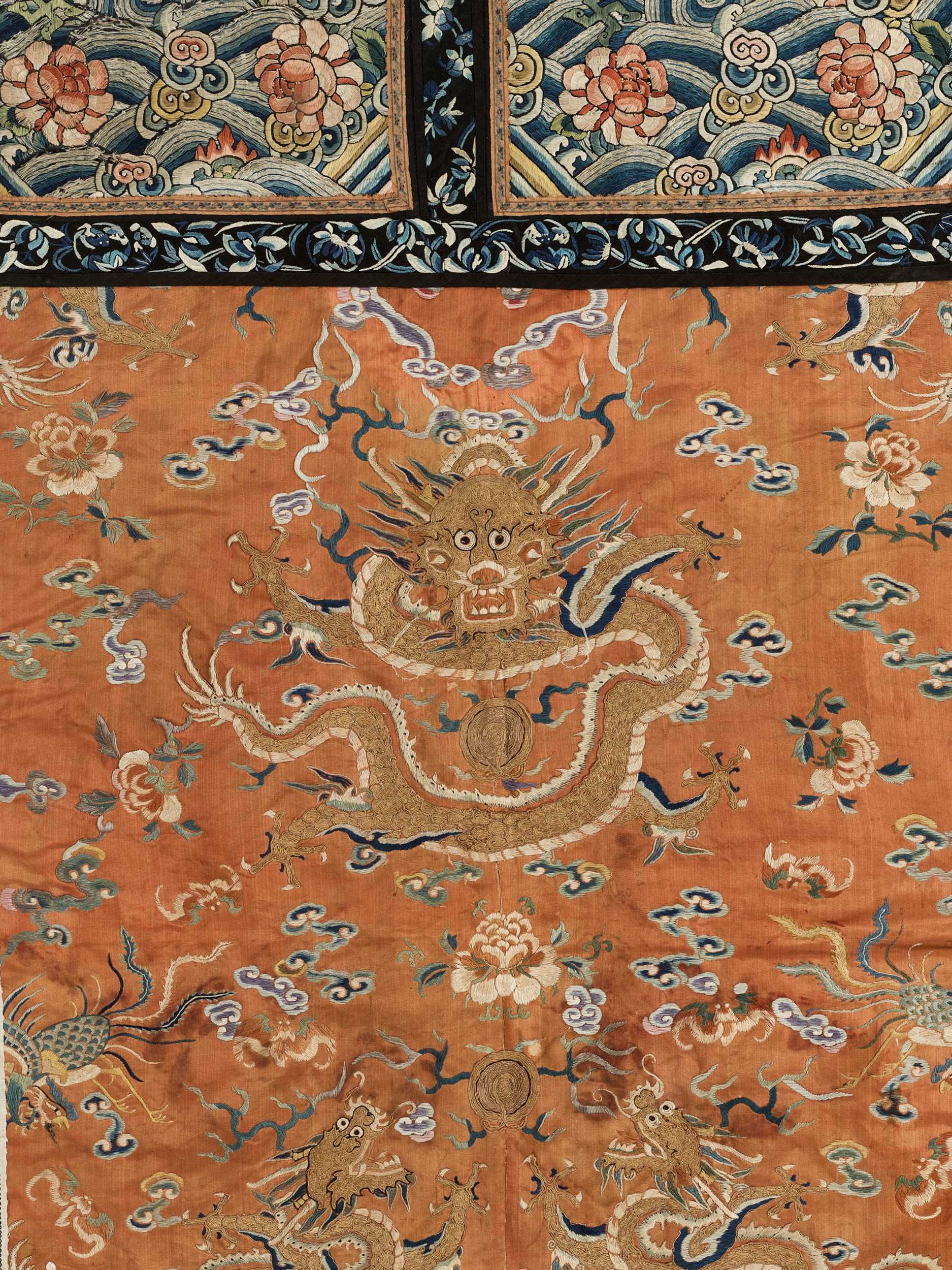 Lot 504 - AN APRICOT-GROUND SILK BROCADE ‘DRAGON’