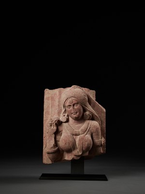 Lot 585 - A PINK SANDSTONE RELIEF DEPICTING A SHALABHANJIKA, MATHURA, SHUNGA PERIOD