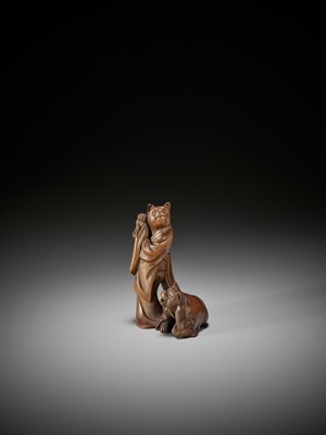 Lot 201 - A RARE WOOD NETSUKE-OKIMONO OF A CAT GEISHA AND CLIENT