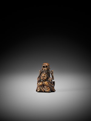 Lot 130 - A WOOD NETSUKE OF A SKELETON MASSAGING OKAME, IN THE STYLE OF SHOKO