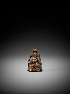 Lot 130 - A WOOD NETSUKE OF A SKELETON MASSAGING OKAME, IN THE STYLE OF SHOKO