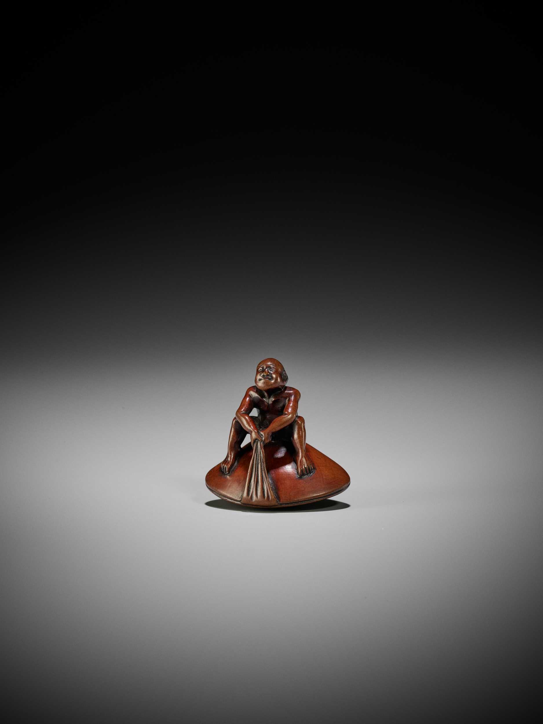 Lot 102 - GYOKUSAI: A FINE WOOD SHUNGA NETSUKE OF MAN