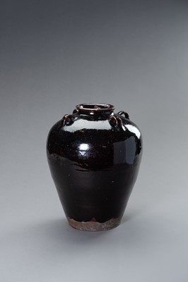 Lot 698 - A LARGE AUBERGINE GLAZED MARTABAN STORAGE JAR