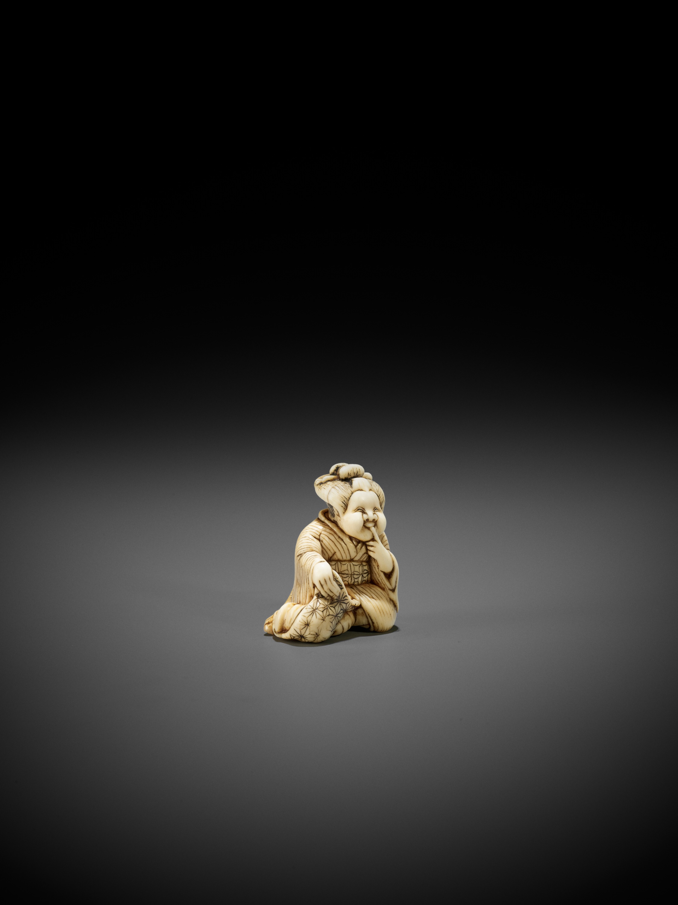 Lot 97 - A RARE IVORY SHUNGA NETSUKE OF OKAME WITH