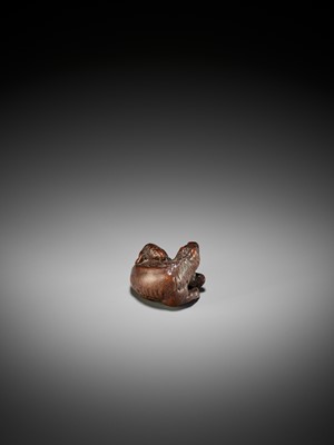 Lot 111 - KOKEI: A RARE WOOD NETSUKE OF A HORSE WITH YOUNG