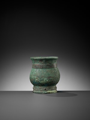 Lot 353 - A BRONZE RITUAL WINE CUP, ZHI, LATE SHANG TO EARLY WESTERN ZHOU