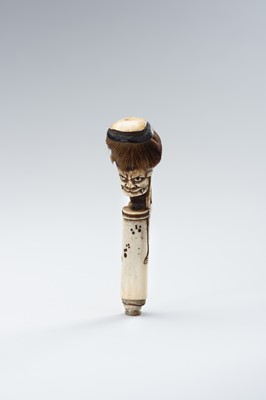 Lot 498 - A STAG ANTLER CANE HANDLE OF AN ONI