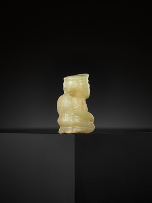 Lot 1033 - AN EXTREMELY RARE YELLOW JADE ‘KNEELING FIGURE’, SHANG DYNASTY