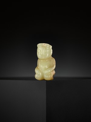 Lot 48 - AN EXTREMELY RARE YELLOW JADE ‘KNEELING FIGURE’, SHANG DYNASTY
