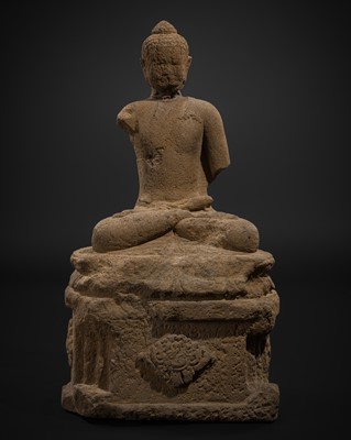 Lot 469 - A MAJAPAHIT VOLCANIC STONE FIGURE OF BUDDHA VAIROCANA