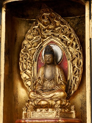 Lot 122 - A LACQUER ZUSHI (PORTABLE BUDDHIST SHRINE) WITH KANNON BEHIND A SILVER MIRROR