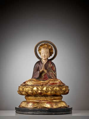 Lot 118 - A POLYCHROME AND GILT-LACQUERED FIGURE OF A BUDDHIST MONK