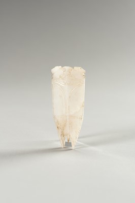 Lot 246 - A HAN-STYLE ARCHAISTIC WHITE JADE OF A CICADA