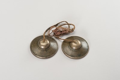 Lot 65 - A PAIR OF TWO SMALL TIBETIAN RITUAL CYMBALS