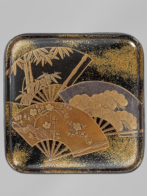 Lot 145 - A LACQUER KOGO (INCENSE BOX) AND COVER WITH FANS DEPICTING THE SHOCHIKUBAI