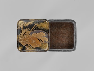 Lot 145 - A LACQUER KOGO (INCENSE BOX) AND COVER WITH FANS DEPICTING THE SHOCHIKUBAI