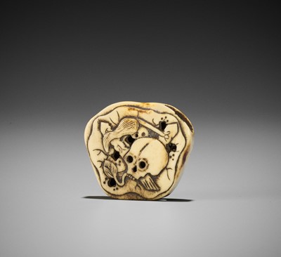 Lot 496 - A STAG ANTLER NETSUKE WITH SKULL AND LOTUS