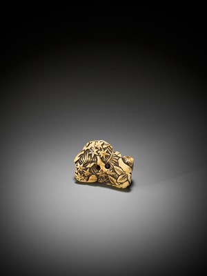 Lot 230 - A RARE KYOTO SCHOOL STAG ANTLER NETSUKE OF A RESTING BOAR