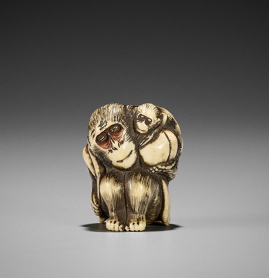 Lot 229 - A STAG ANTLER NETSUKE OF A MONKEY WITH PEACH AND YOUNG