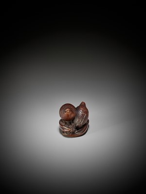 Lot 589 - OKATOMO: A RARE STAINED WOOD NETSUKE OF TWO QUAILS ON MILLET